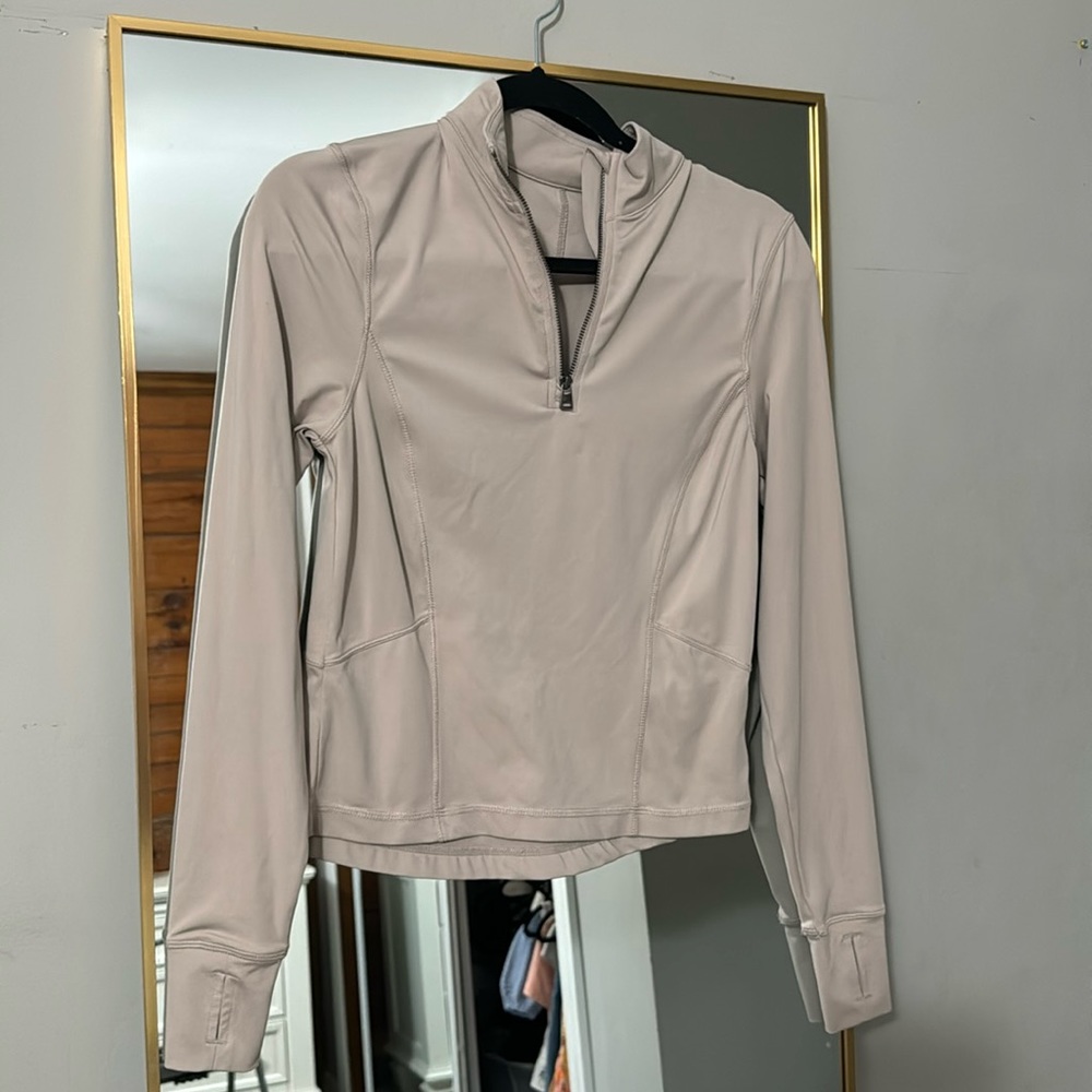 Tan half zip athletic jacket